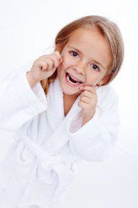 19981262 - Little Girl Flossing - Oral Hygiene Education In Childhood