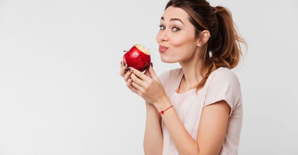 6 Natural Teeth Whitening Methods Using Basic Foods, Apples